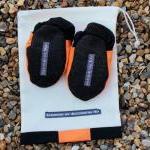Baby booties, orange and bl..