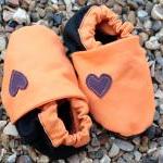 Baby booties, orange and bl..