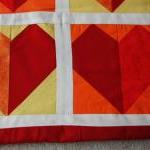 Baby cot quilt - red hearts