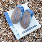 Baby booties, blue flowers,..