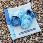 Baby booties, blue flowers,..