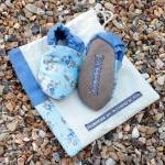 Baby booties, blue flowers,..