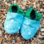 Baby booties, blue and whit..
