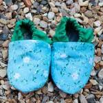 Baby booties, blue and whit..