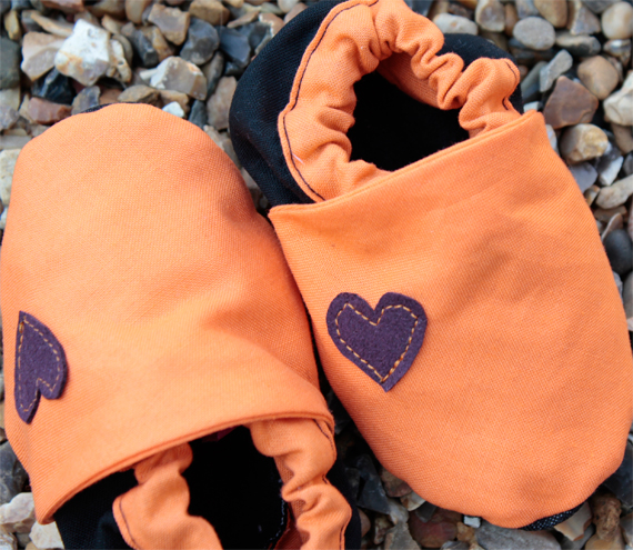 Baby booties, orange and black 3-9 months