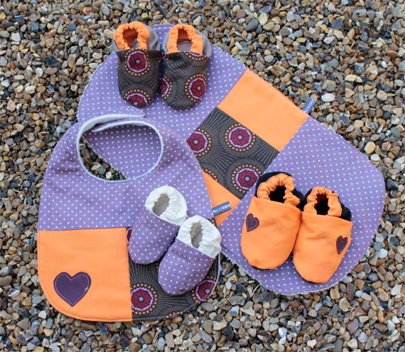 Deluxe baby set - bib, burp cloth, 3 pairs of booties (spotty, purple and orange)