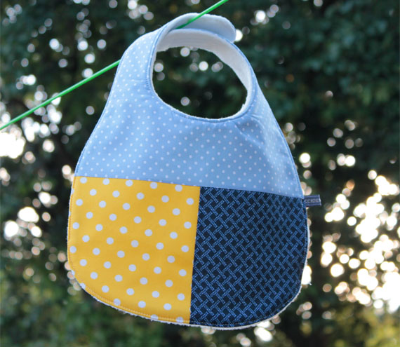 Baby bib - blue and yellow spots