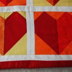 Baby cot quilt - red hearts