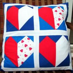 Red white and blue hearts cushion